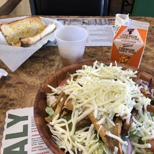Grilled Chicken Salad, comes with garlic bread.