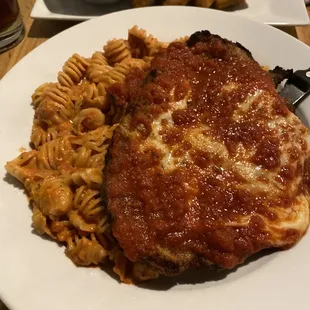 Chicken Parm with pasta (pink sauce on the pasta)