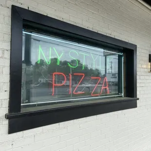 neon sign in window