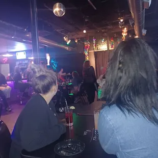 a group of people sitting at a table