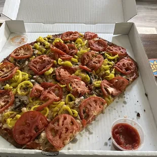Veggie pizza (tomato, mushroom, banana pepper, onion) but we should have gotten more sauce to dip it in
