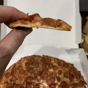 Pepperoni on traditional thin sweet crust.
