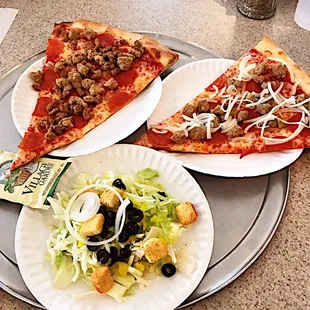 Lunch special - one slice, side salad, and drink for $7.25. Additional toppings are 50 cent each.
