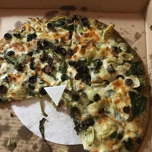 a whole pizza in a box