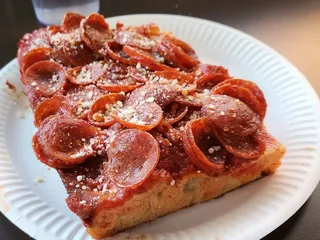 Pizza Supreme Being