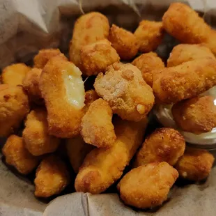 Cheese curds, not beer battered like the menu says