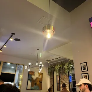 a crowd of people sitting at tables
