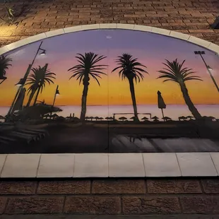 palm trees and a sunset