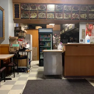 a restaurant with a checkered floor