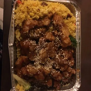 Sesame Chicken dinner with fried pork rice also comes with egg roll