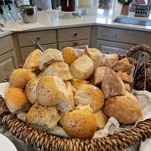 Fresh hot french bread and rolls with homemade herb butter