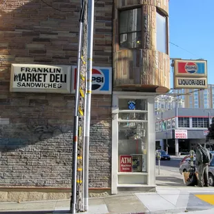a brick building with a sign on it