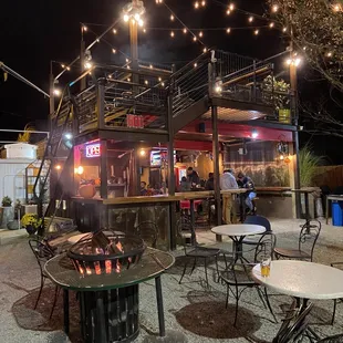 Outdoor patio, fire pit, cool lighting