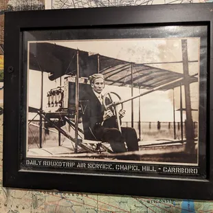 Inside one of the two unisex restrooms. I thought the caption to this photo was interesting. Roundtrip air service from where?