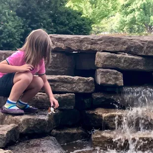 Man made creek with waterfall