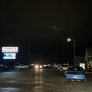 Outside, parking lot