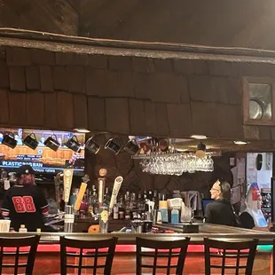 a bar with a red carpet