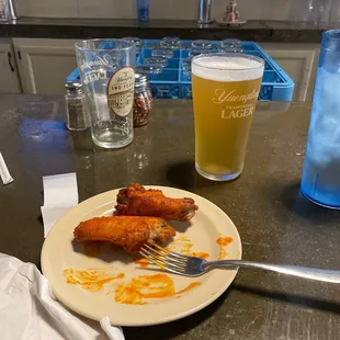Wings and beer before pizza.