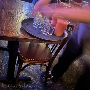 a tray of shot glasses on a table