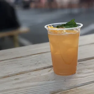 a drink in a plastic cup