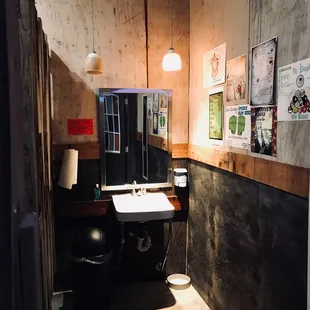 a bathroom with a sink and mirror