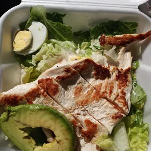 Large grilled chicken ceaser salad which was for 9.99$ added avocado which was 3.99$ and eggs .50 15$ total.