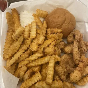 Fried shrimp with Cajun fries and coleslaw