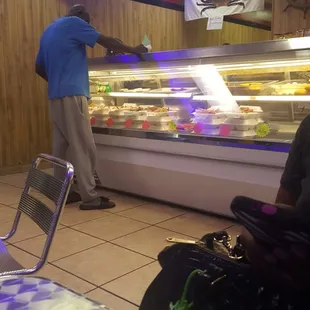 a man standing in front of the counter