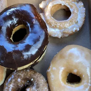 a variety of donuts in a box