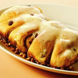 a plate of donuts with icing