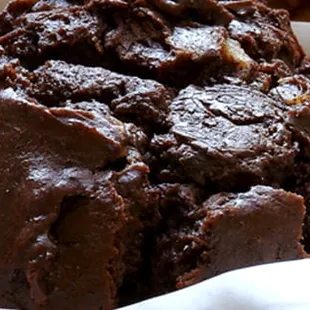 a chocolate muffin in a basket