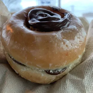 a chocolate frosted doughnut