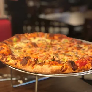 Build your own pizza: Ground beef, mushrooms green peppers &amp; onions. Cooked well done.