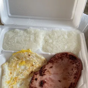 2 Eggs  over hard, with Ham Steak, Grits