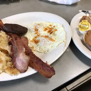 Frank&apos;s Grill Special* 2 eggs  2  mini waffles, sausage and hash browns