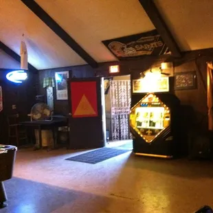 a pool table in the middle of the room