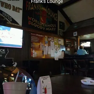 a view of the bar from the dining area