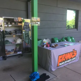 Check in table and branded swag. Also, waterproof bags and other useful items for paddling