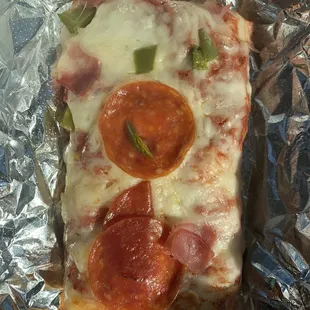 a slice of pepperoni pizza