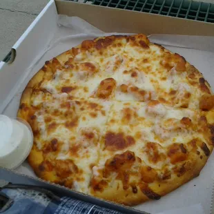 The Buffalo Chicken Pizza with ranch dressing