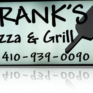 a sign for frank's pizza and grill