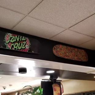 a skateboard on the ceiling