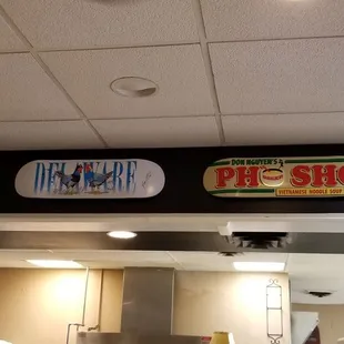 signs above the counter