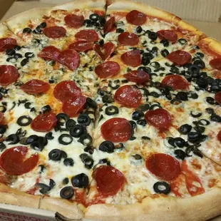 a pepperoni and olive pizza
