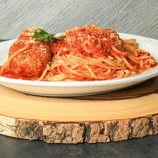 Spaghetti w/ MeatBalls tossed in our homemade marinara sauce