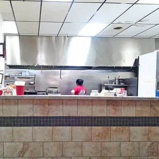 a man in a restaurant kitchen