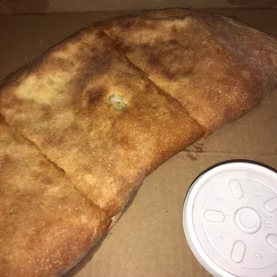 Small Stromboli that I asked them to cut in 3 pieces.