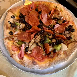 Small deluxe pizza - no cheese