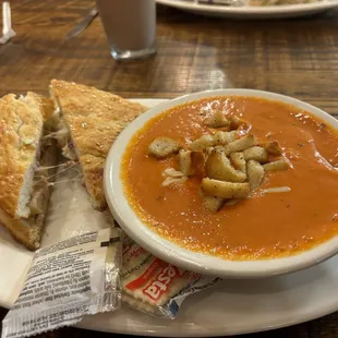 Half sandwich/ soup special: chicken, bacon, ranch, &amp; a bowl of their famous tomato basil soup. Fresh basil grown inside the restaurant!!