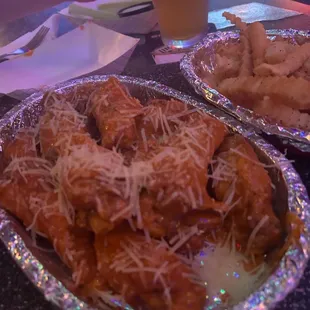 Garlic parm wings. The freshly grated cheese is such a good touch. Best wings in the city by far.
